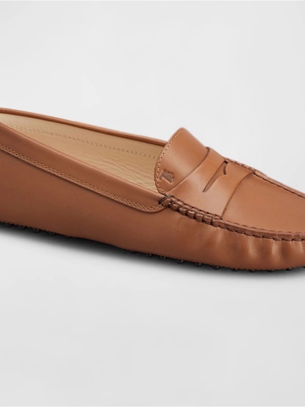 Tod's women’s Leather Penny Loafers in Cognac Brown